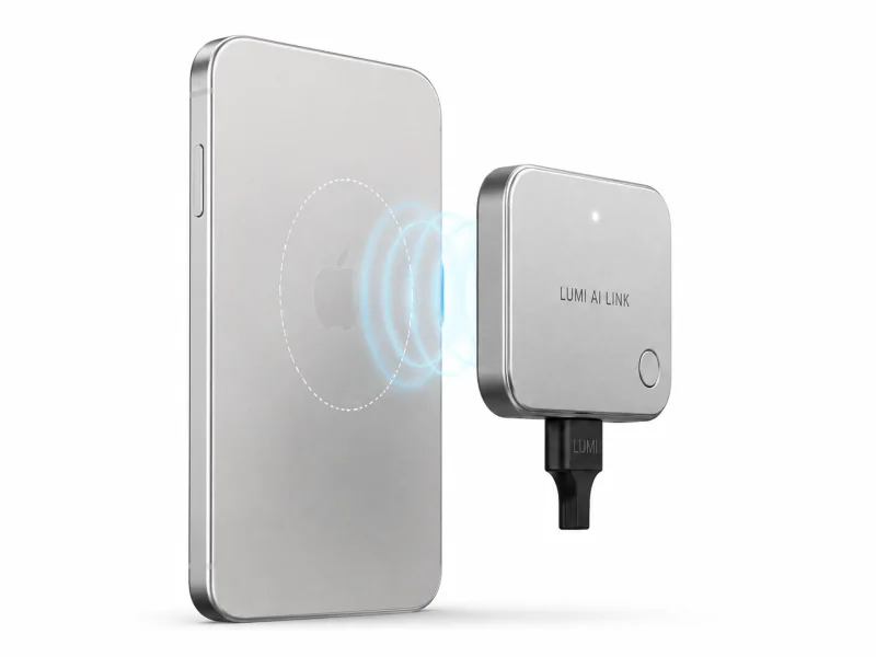 Lumi AI Link magnetically aligning with an iPhone